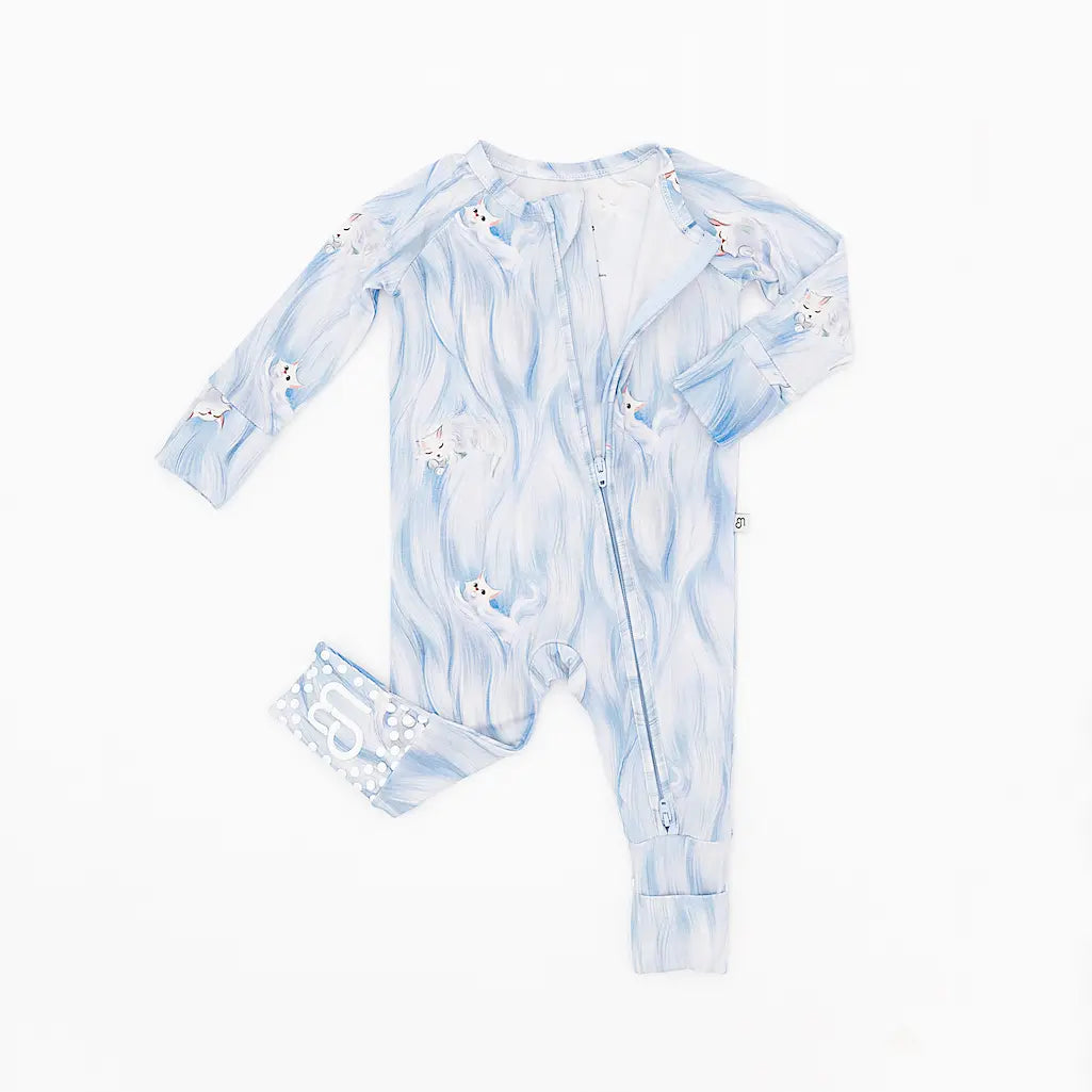 Baby onesie with blue and white pattern on a white background