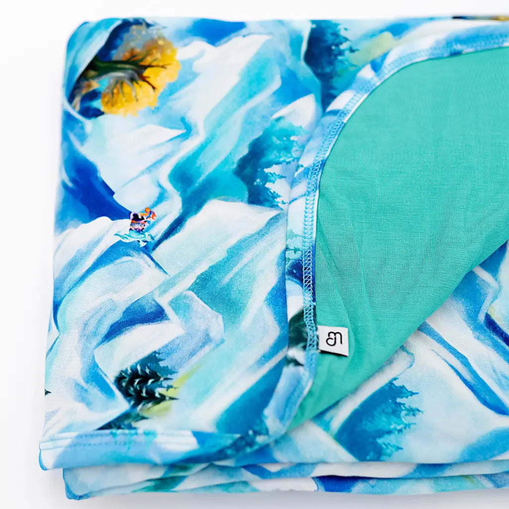 Floral patterned fabric with a visible brand label on a white background