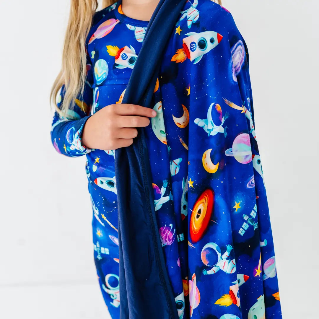 Astronauts in Space Blanket