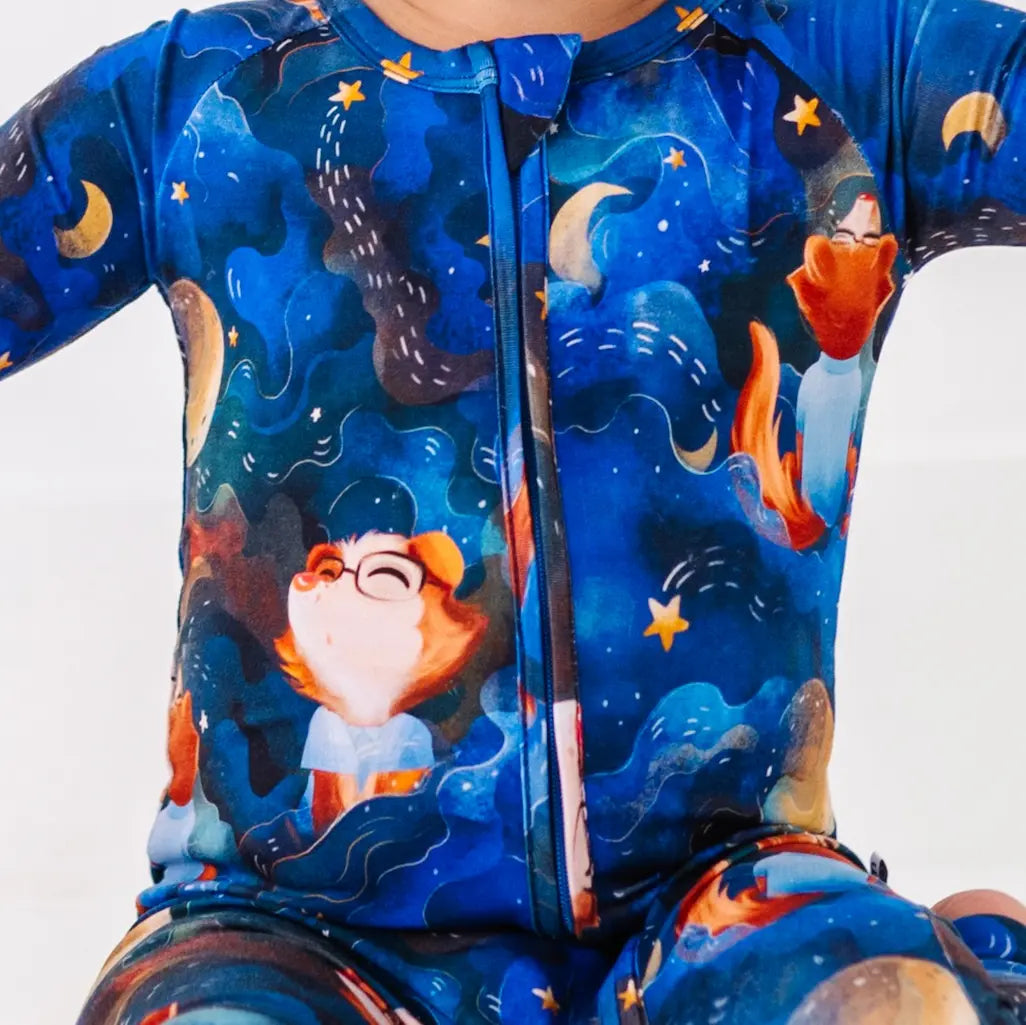 Close-up of a colorful patterned garment with stars and lights design on a white background