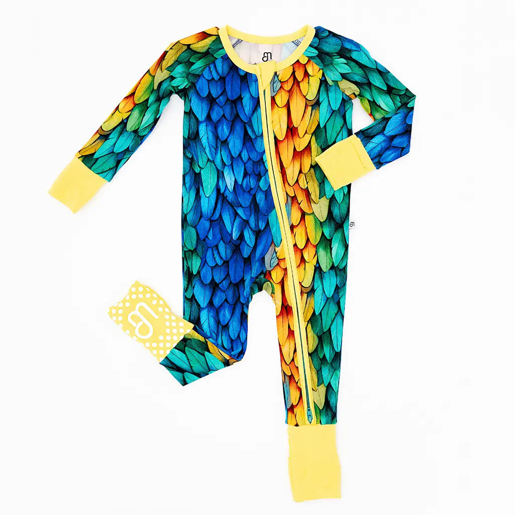 Colorful feather-patterned onesie with a matching hat on a white background