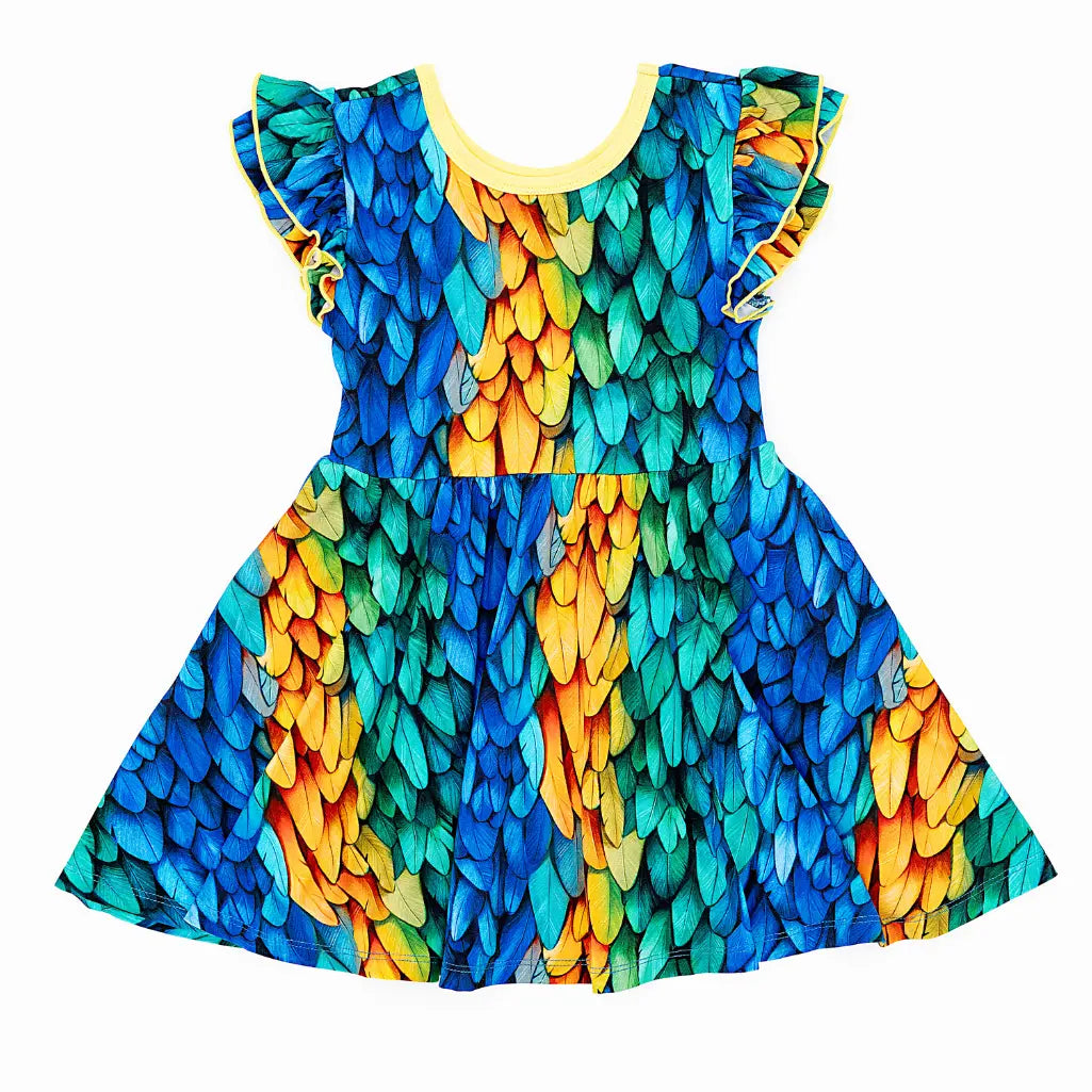 Colorful dress with feather pattern on a white background