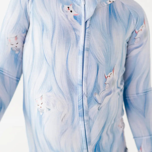 Light blue onesie with white cat illustrations on a white background