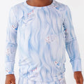Long-sleeve shirt with a blue and white abstract pattern on a plain background