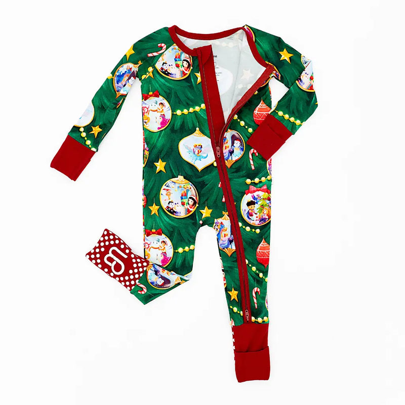 Christmas-themed baby onesie with colorful patterns on a white background