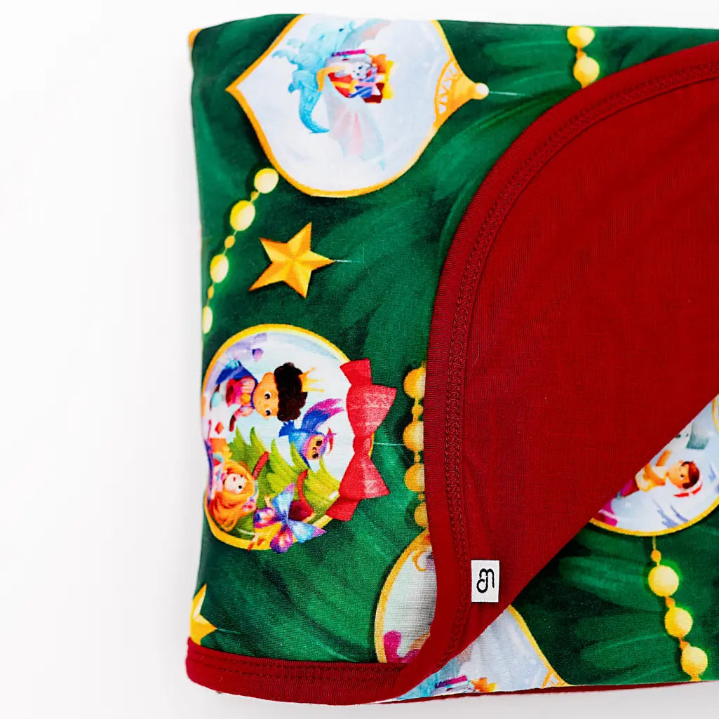 Colorful fabric with cartoon characters and festive design on a white background