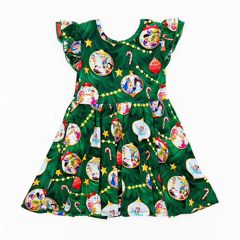Green dress with Christmas-themed ornaments and characters on a white background