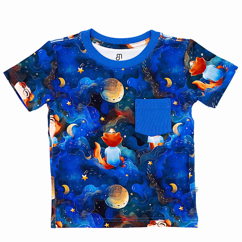 Children's t-shirt with space-themed design featuring planets and astronauts on a blue background.