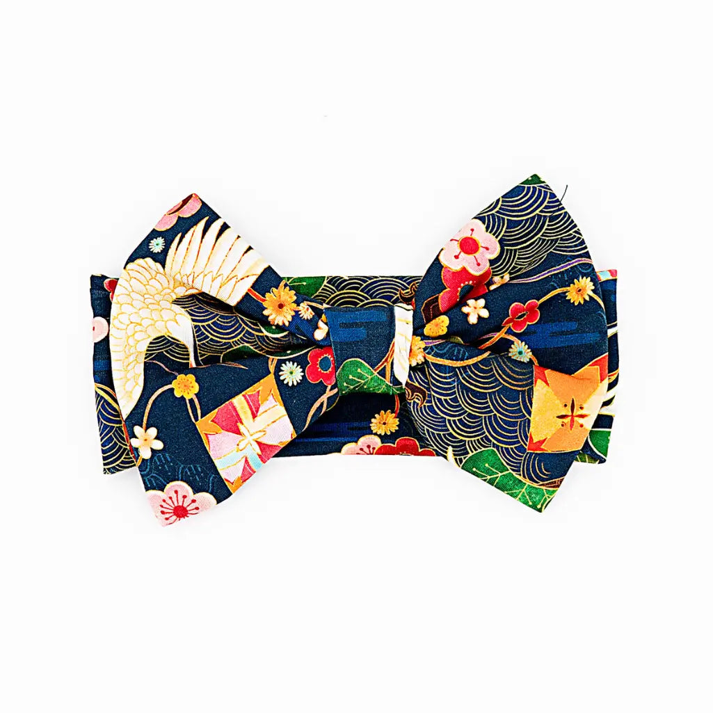 Colorful headband with traditional design on a white background