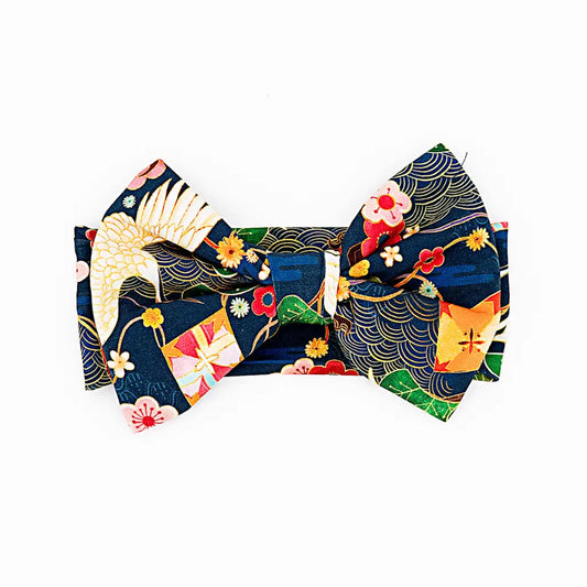 Colorful headband with traditional design on a white background