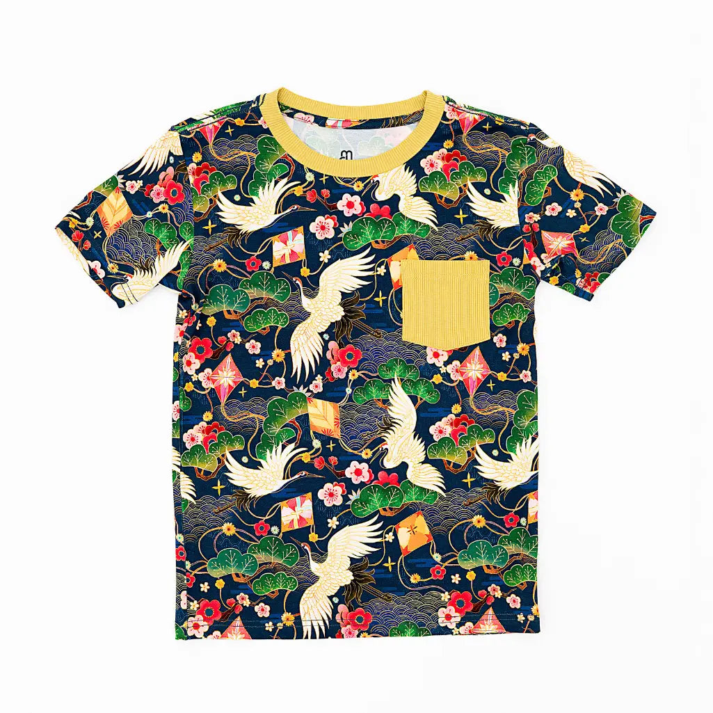 Colorful t-shirt with nature-themed design on a white background