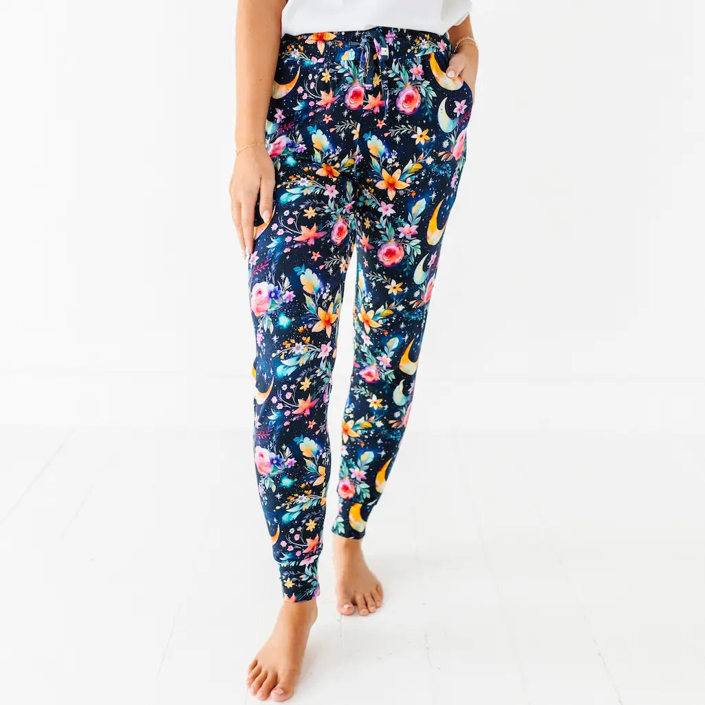 Leggings with floral and moon design on a white background
