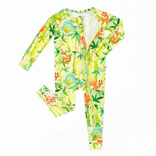 Children's onesie with a colorful animal pattern on a white background