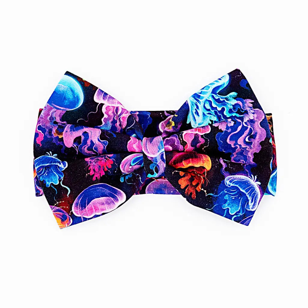 Colorful jellyfish patterned bow tie on a white background
