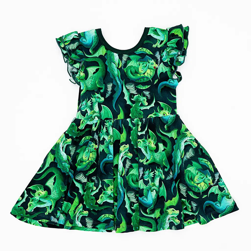 Dress with green dragon pattern on a white background