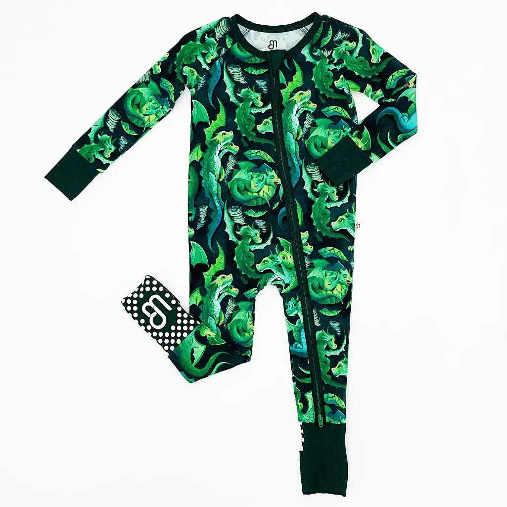 Green and black patterned onesie with a matching bootie on a white background