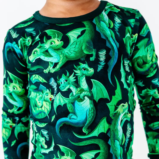 Long-sleeve shirt with green dragon pattern on a black background