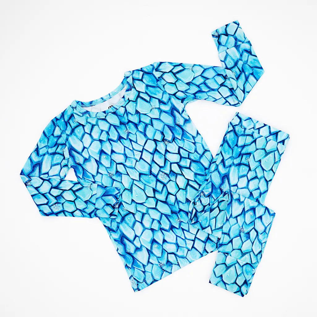 Blue mosaic-patterned outfit on a white background