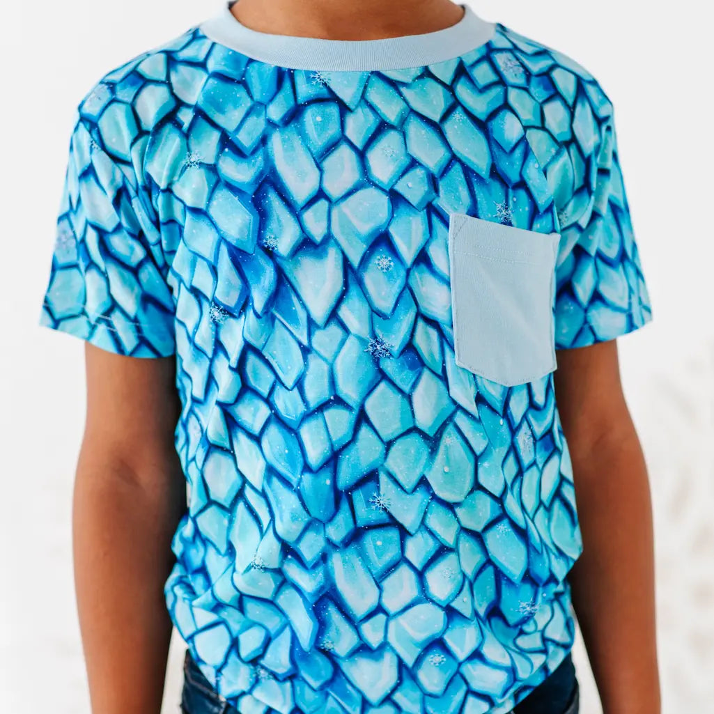 Blue patterned shirt worn by a person on a white background