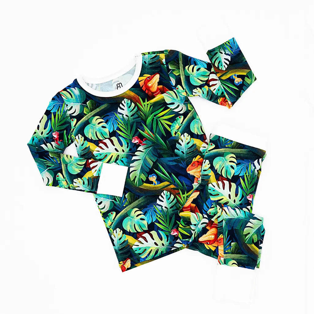 Tropical leaf patterned outfit on a white background