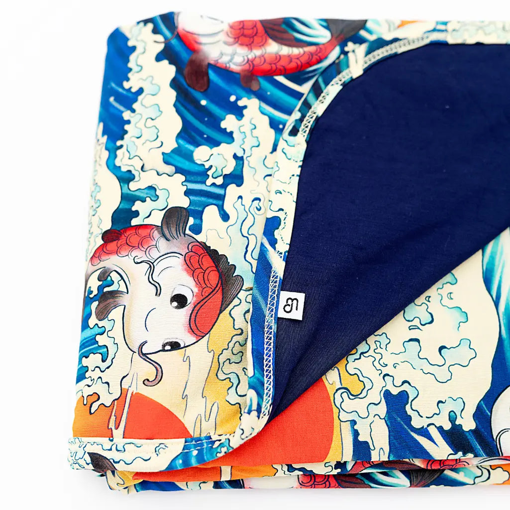 Colorful fabric with cartoon character design on a white background
