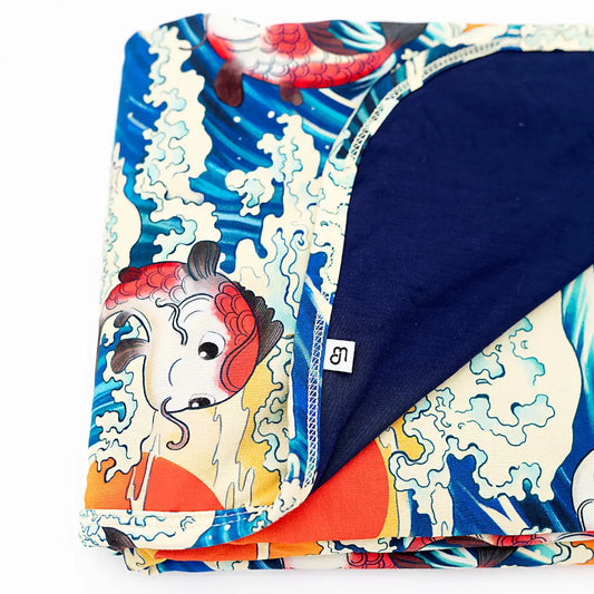 Colorful fabric with cartoon character design on a white background