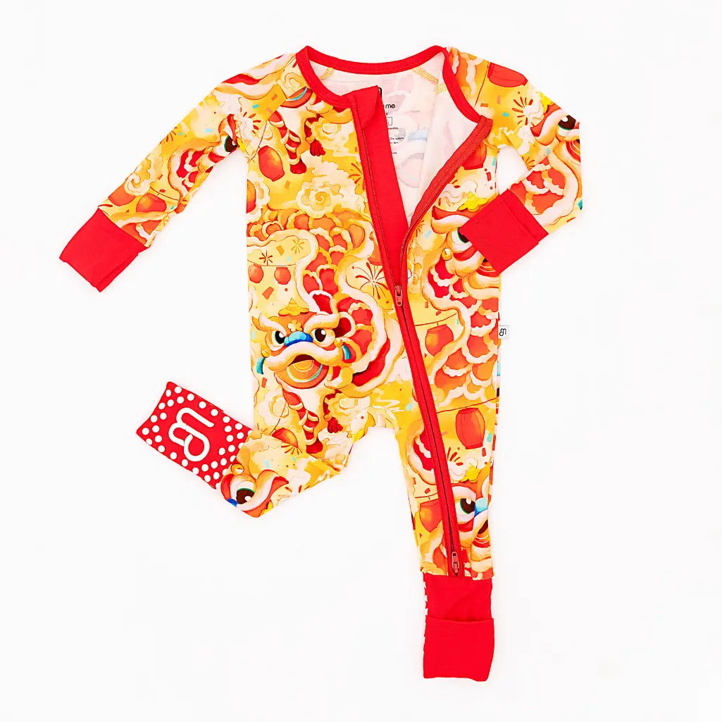 Colorful baby onesie with a cartoon design on a white background