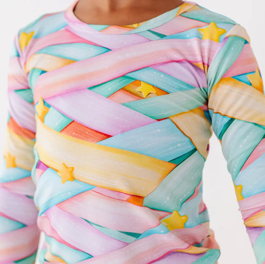 Colorful patterned shirt with pastel colors and star shapes