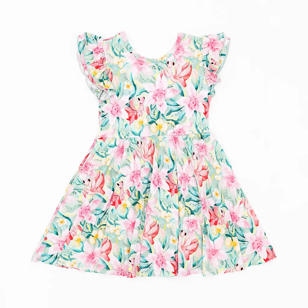 Floral dress with pink and green flowers on a white background