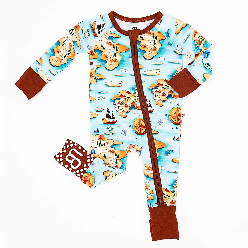 Children's onesie with pirate map design on a white background