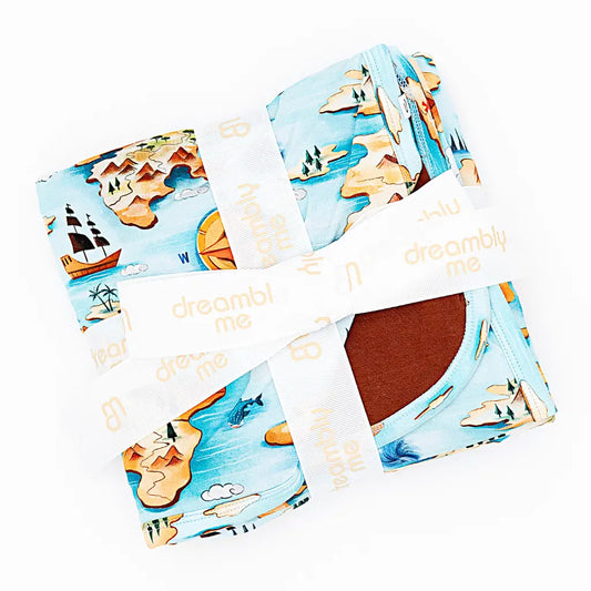 Makeup product with a tropical design and 'dreamily me' branding on a white background
