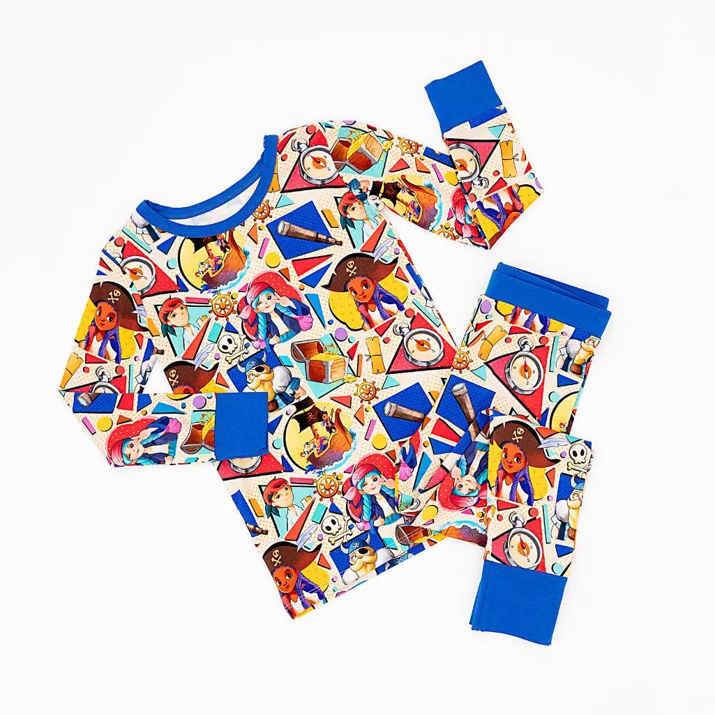 Colorful children's pajama set with cartoon characters on a white background