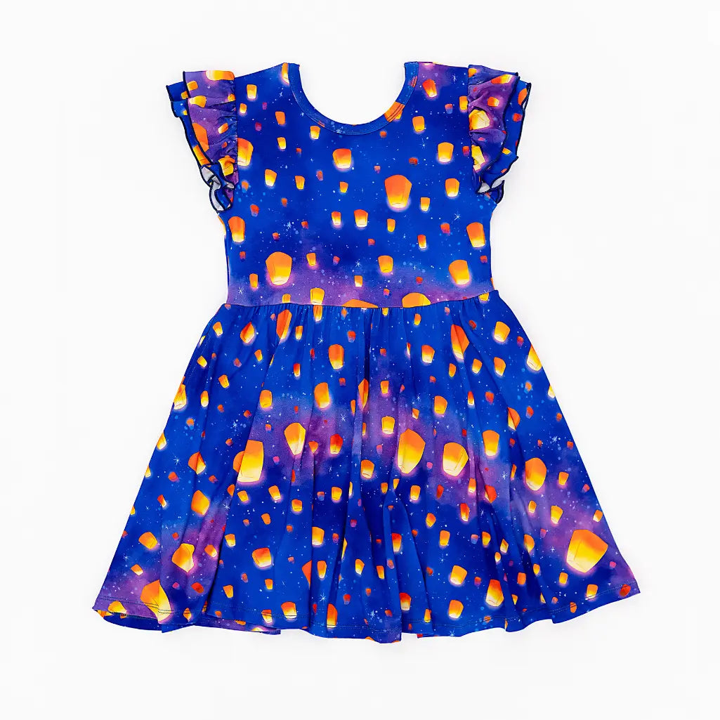 Blue dress with orange and yellow pattern on a white background