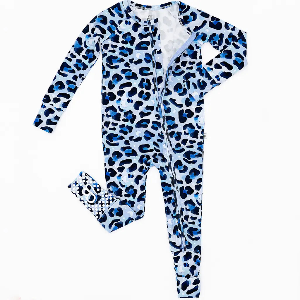 Blue and white leopard print onesie with matching headband on a white background