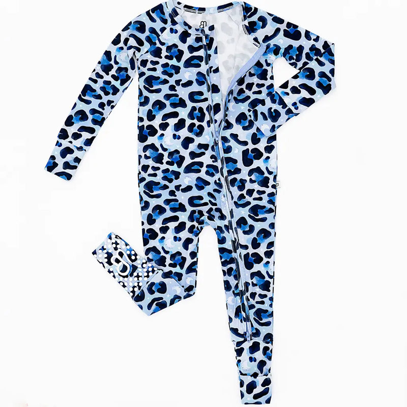 Blue and white leopard print onesie with matching headband on a white background