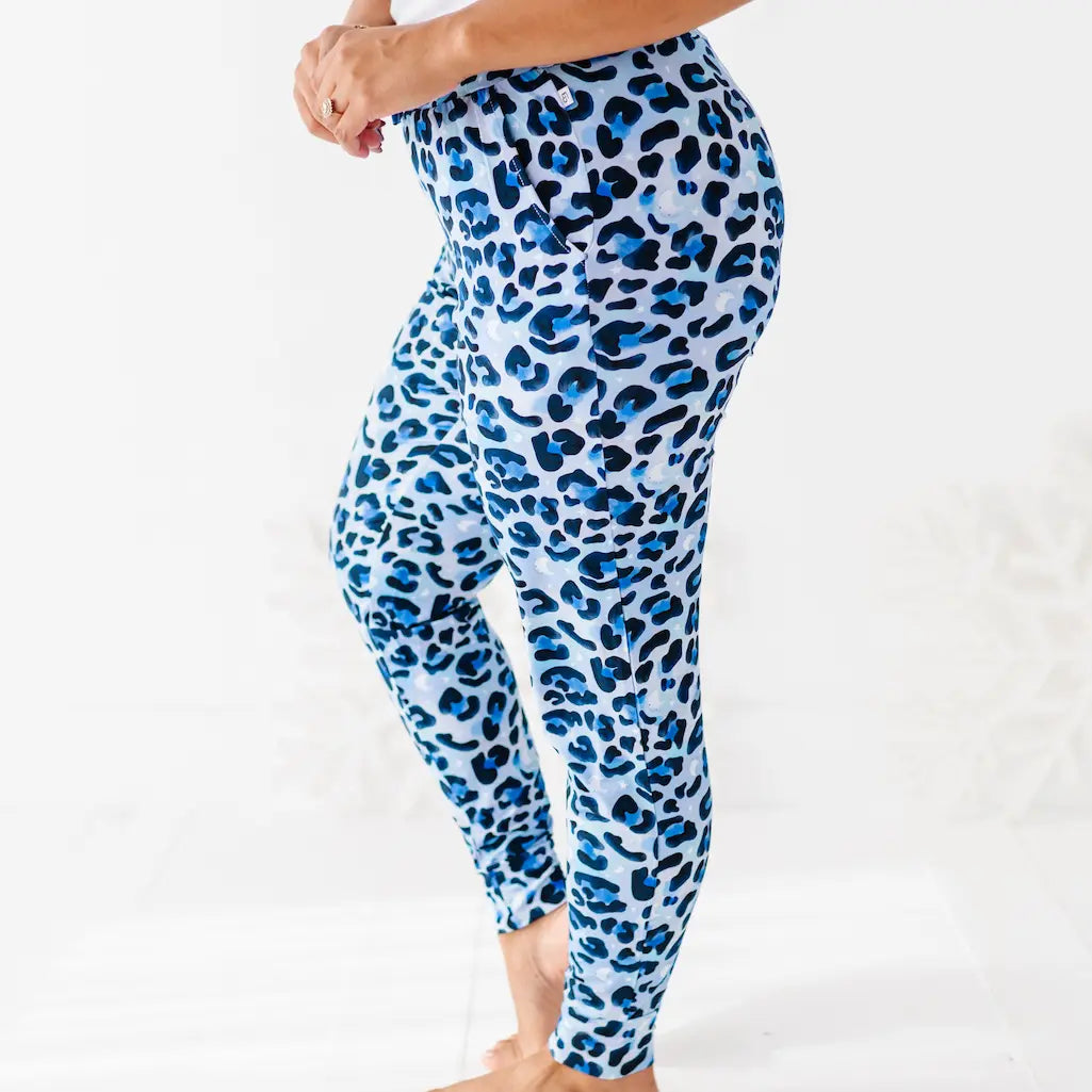 Blue and white leopard print leggings on a white background