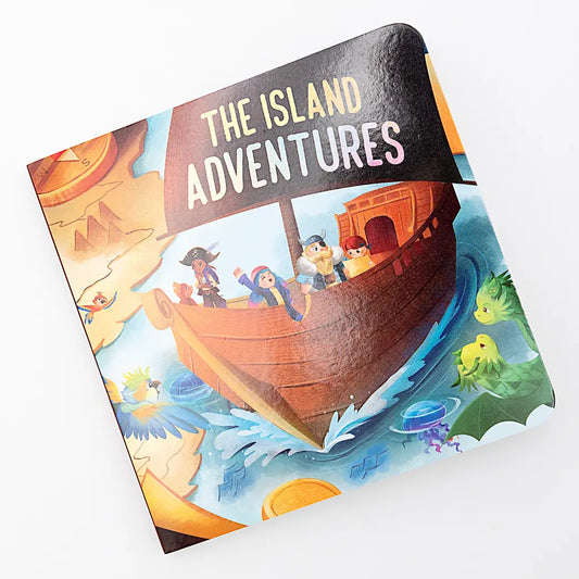 Children's book titled 'The Island Adventures' with a boat and island illustration on the cover.