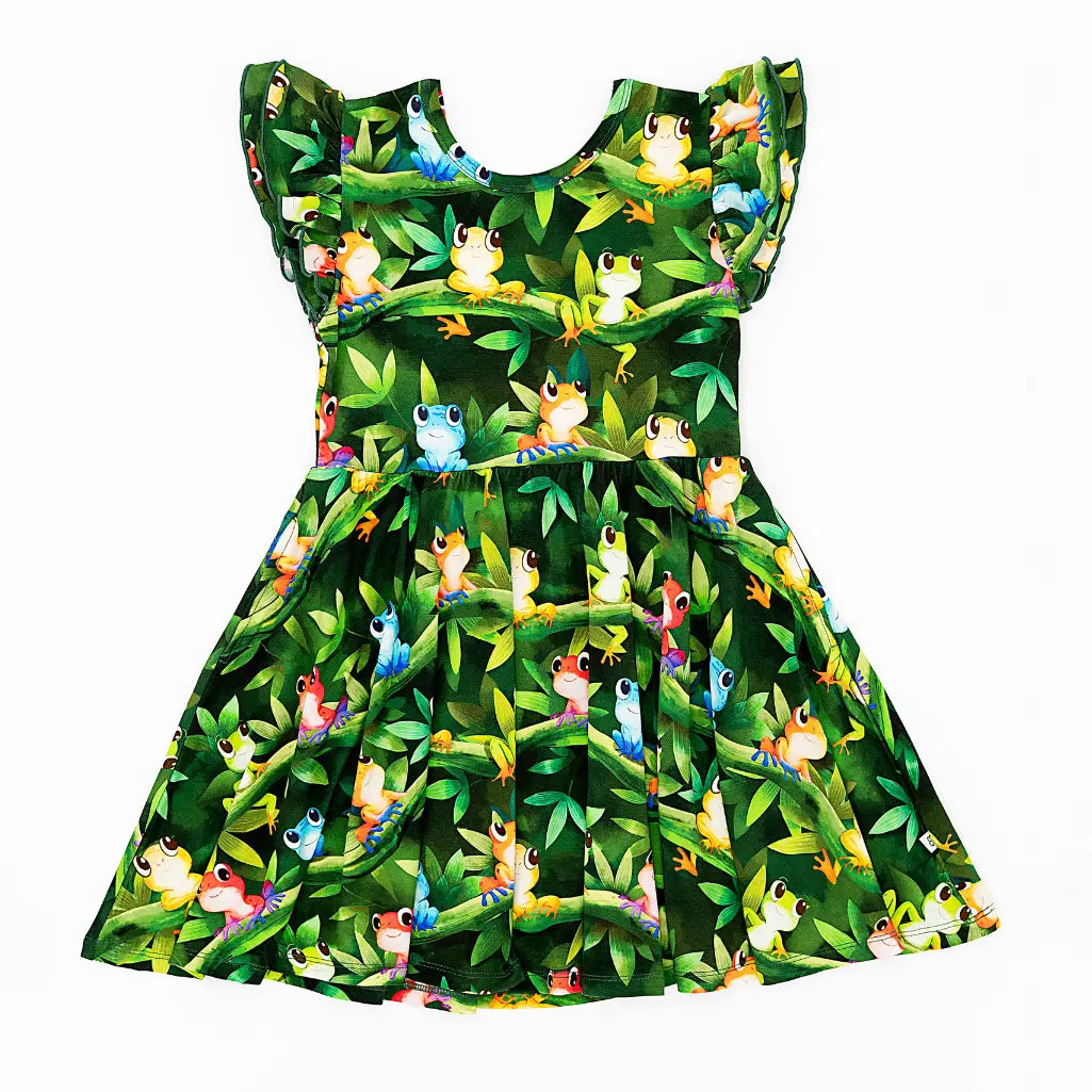 Green dress with colorful animal pattern on a white background