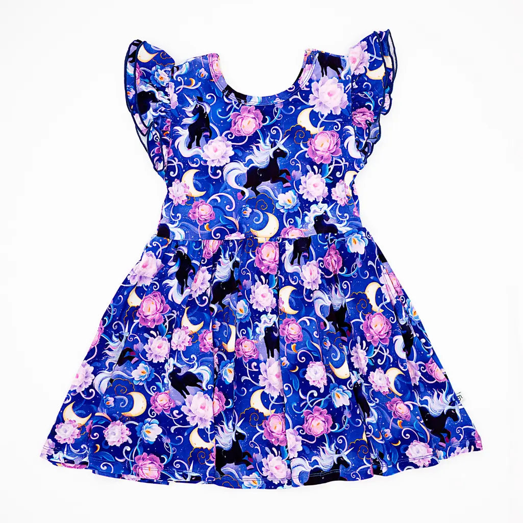 Dress with cat and flower pattern on a blue background