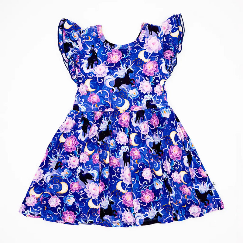 Dress with cat and flower pattern on a blue background